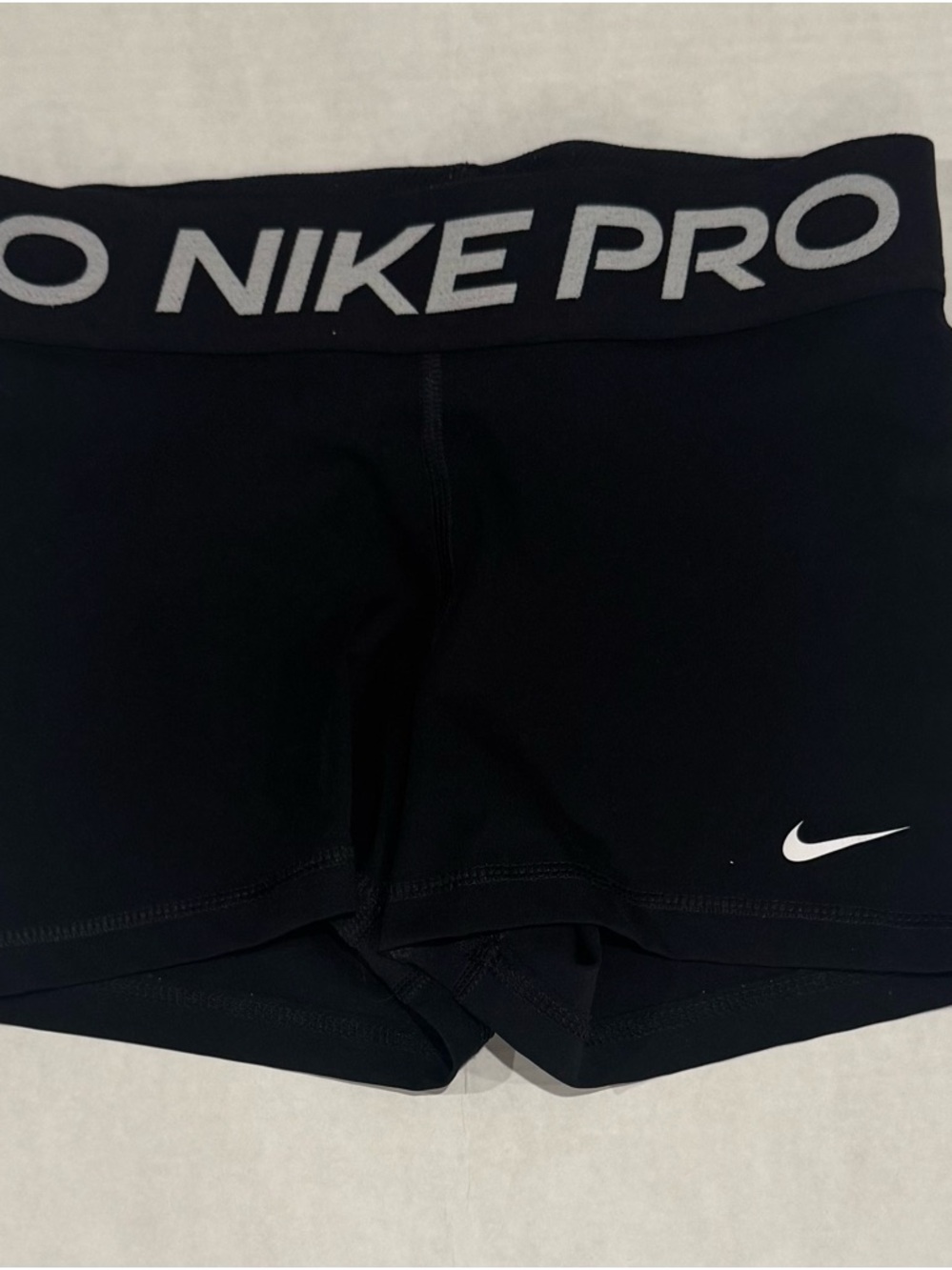 Nike Black Athletic Compression Shorts with White Swoosh